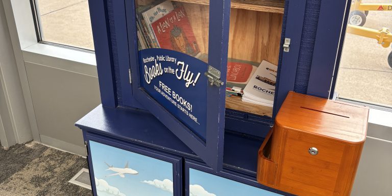 Rochester International Airport's (RST) little library filled with books and activities.